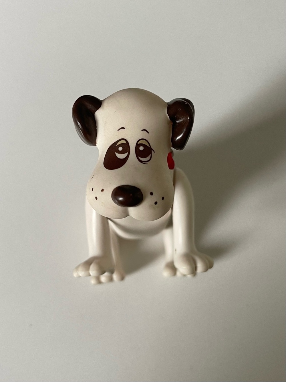 Vintage Pound Puppies White Brown Spot Dog
Poseable 3.75" Figure 1986